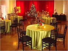 A commercial dining room with a christmas tree in the distance