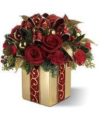 Flowers in a vase that looks like a gift