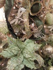 A close up of festive decor with ornaments